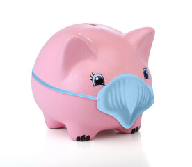 Pink piggy bank wearing a medical mask. Isolated on white background