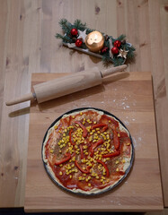 Closeup of homemade pizza with christmas decoration