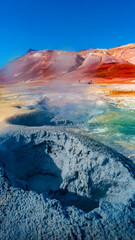 Colorful geothermal active zone Hverir near Myvatn lake in Iceland, resembling Martian red planet...