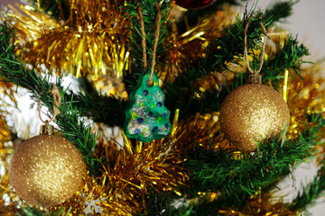 Christmas tree toy made by a child. Handmade toy for the Christmas tree.
