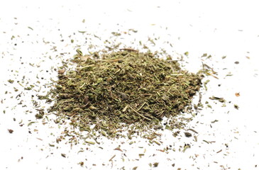 Dry chopped summer savory (Satureja hortensis) isolated on white background