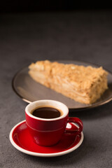 coffee expresso with a slice of delicious napoleon cake