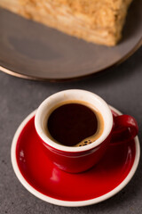 Obraz premium coffee expresso in a red coffee cup