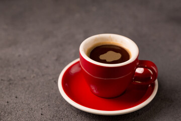 Black coffee in a red cup