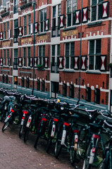 Verf en Vernis Fabriek factory located in Amsterdam, Netherlands with bikes in the front and building built with bricks