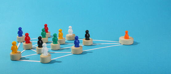 the concept of connections in an abstract community. multicolored figures of people in the form of...