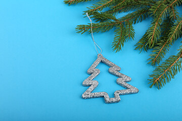 christmas tree on blue background with copy space