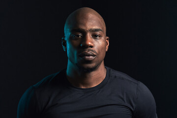 Studio portraint of black athletic man