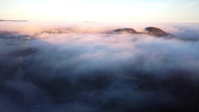 Winterberg over the clouds - drone view