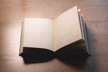 Blank page book with copy space on the desk background.
