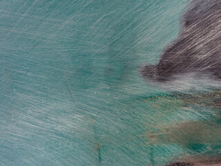 car putty on yellow car parts.