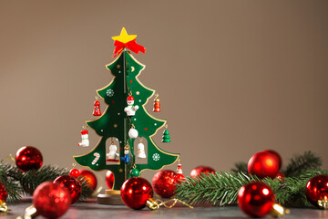 Wooden christmas tree with small wooden toys