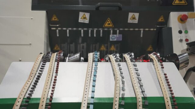 Component supply for automatic pick and plac machine. Placing components on the board.