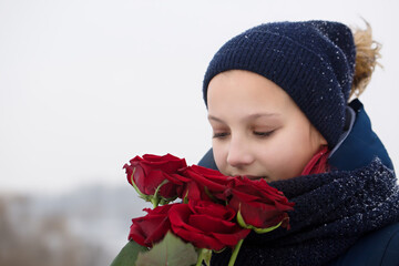 Beautiful girl with roses