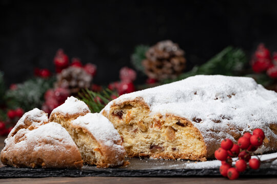 Christmas baking. Christmas stollen with fruit and nuts, Christmas background