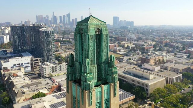 Good aerial of the Bullocks Wilshire Art Deco historical building and copper summit in Los Angeles, California.