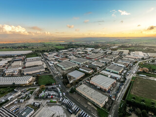 Obraz premium Industrial Area - Aerial view with Drone of Warehouses. Fiano Romano zona industriale