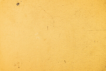 Naklejka premium Zółte jasne tło betonowo kamienne.
