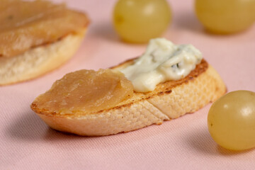 homemade quince jam. slices of bread with cheese and quince jam.