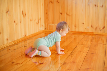 little child playing on floor