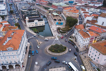 drone shot aerial view from above look Aveiro Portugal cloudy day city center rooftops orange red Monumento ao Marnoto e à Salineira
christmas tree