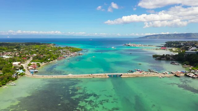 Aerial view of the Dauis bridge between Bohol and Panglao Islands. Bridge over the sea Strait with traffic and cars. Bohol,Philippines.
