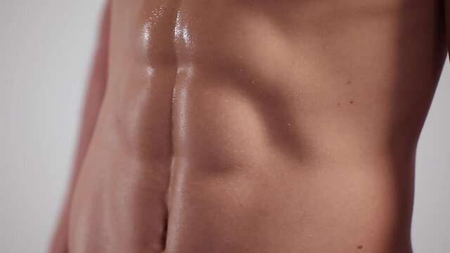 Close up of stomach and chest of man