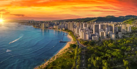 Peel and stick wall murals Beach sunset Honolulu with a vibrant red sunset