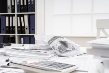 business problem concept - broken reports on businessman's working table