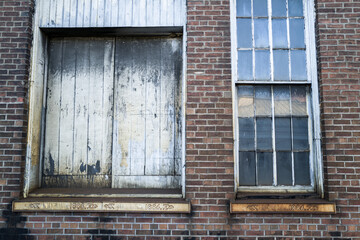 Fototapeta na wymiar abandoned warehouse glass windows 