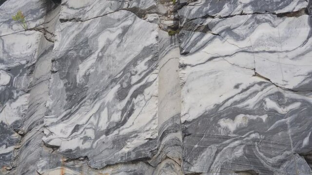 Marble rock deposits water canyon, landscape rocks with reflection. Beautiful and majestic nature of the stones. Geology the quarry raw.
