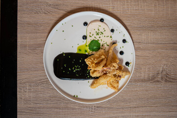 Crispy calamari with white taramas cream and ink sauce
Chef Daniel Krbasian