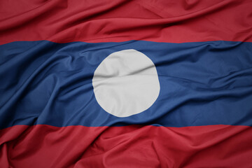 waving colorful national flag of laos.
