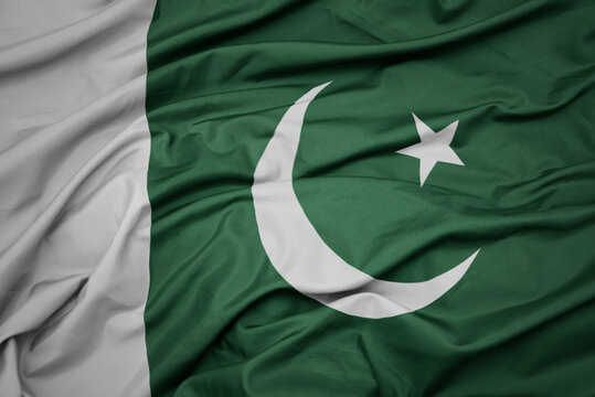 waving colorful national flag of pakistan.