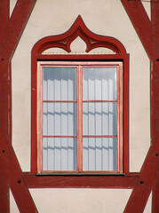 Gothic ogee shaped window frame at the half-timbered Tanzhaus building in the old town of Nördlingen in Germany
