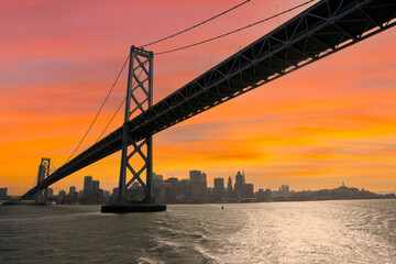 Sunset view of the Bay Bridge between San Francisco and Oakland California.