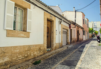 Fototapeta na wymiar Empty street of the old town in Palma de Mallorca, Spain