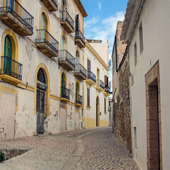 Fototapeta na wymiar Classical street of old town in Ibiza, Spain