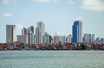 Fototapeta na wymiar Contemporary scyscrapers at the coast in Recife, Brazil