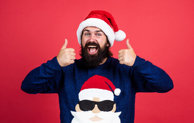 Lets do this. just have fun. happy bearded mature man in santa claus hat. new year party. celebrate...