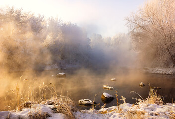 steam over the winter river in the rays of the setting sun, snow, sunset
