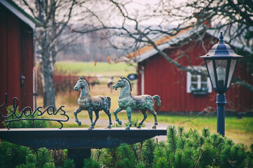 Two bronze statues of horses in Finland