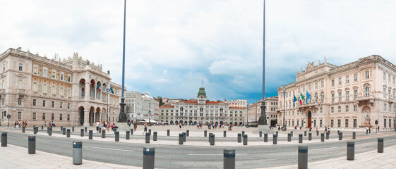 Fototapeta na wymiar Trieste and Piazza Unità d Italia panoramic view on the square - municipality palace and Lloyd triestino palace