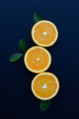 High vitamin C, Juicy and sweet. Fresh orange fruit on dark background.