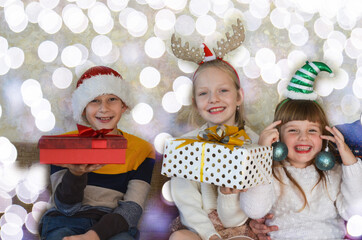 Happy caucasian family celebrating christmas holiday at home. Children having fun together lifestyle
