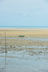 An empty little boat at low tide, Thailand, Ko Samui