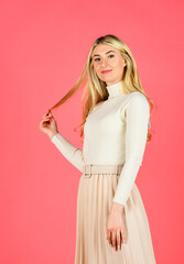 Fototapeta premium Femininity concept. Attractive blonde. Clothes shop. Clothes store. Female outfit. Female beauty. Fashion collection. Looking trendy. Pretty woman feeling comfy. Fashion and beauty. Fashion model