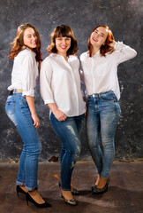 Naklejka premium Cheerful middle aged woman with her children
