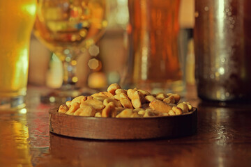 macro of peanuts with cups background
