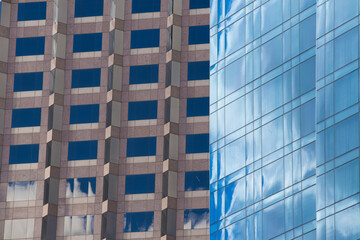 Close-up. Shiny skyscraper windows for the whole frame.